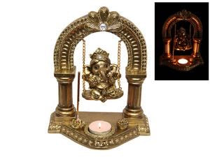 23CM GOLD GANESH ON SWING WITH TEALIGHT AND INCENSE HOLDER. GANGSWIN